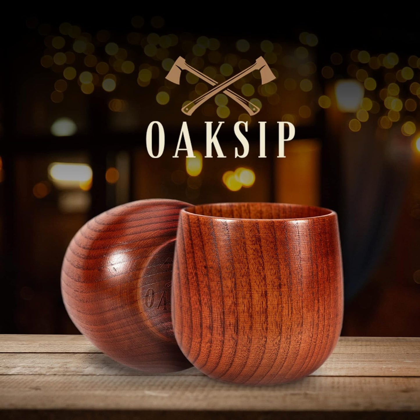 Two uncharred wooden bourbon glass cups, one laying on its side and one standing upright